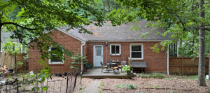 A late 1940's era modern ranch style house with brick exterior.